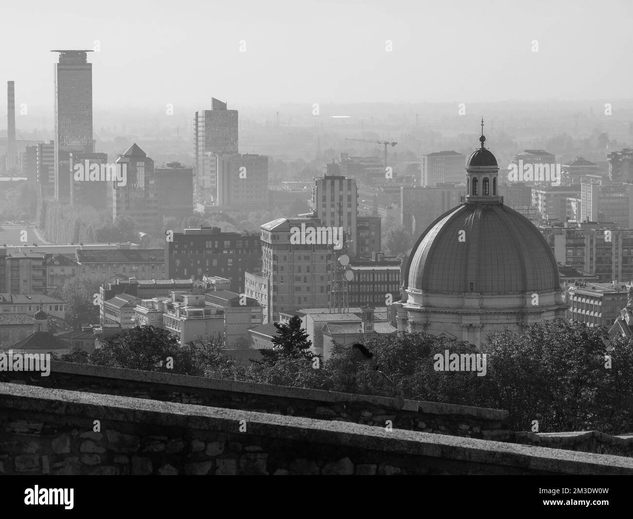 Brescia, Italy - November 2022 Hill top view of Brixia city scenic pano and main roofs Stock Photo