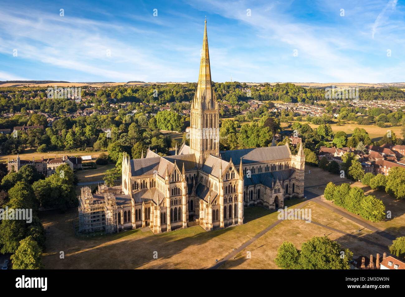 Aerial view of Salisbury cathedral at sunrise, England. Copy space in sky. Stock Photo