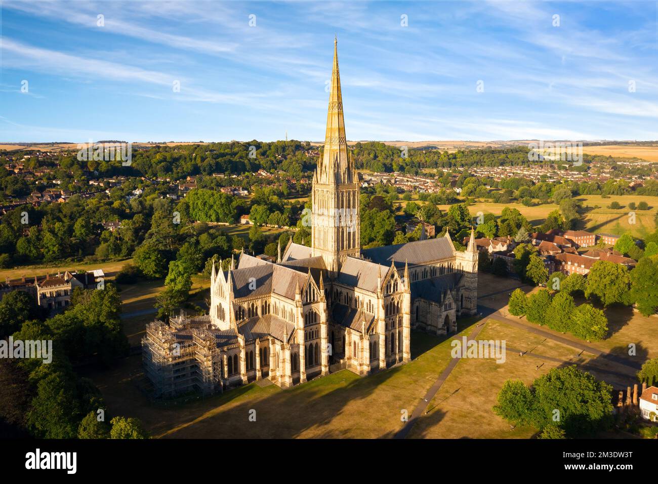 Aerial view of Salisbury cathedral at sunrise, England. Copy space in sky. Stock Photo