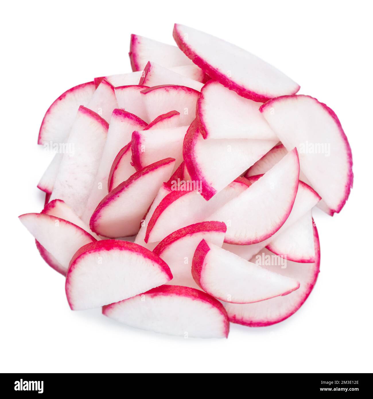 top view of pile of vegetables, radish roots cut into half rings on