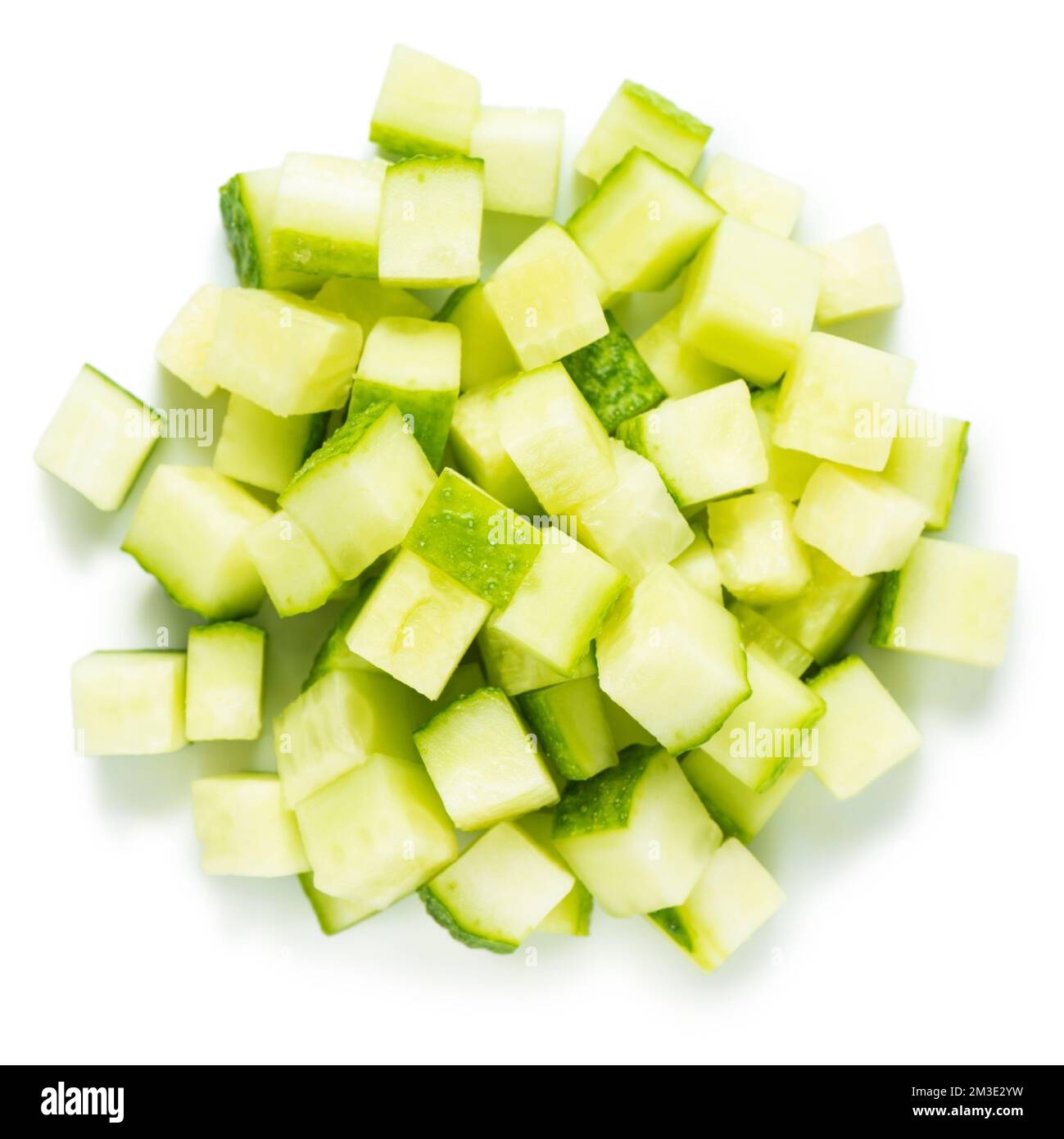 top view of pile vegetable of cucumber diced for salad isolated on
