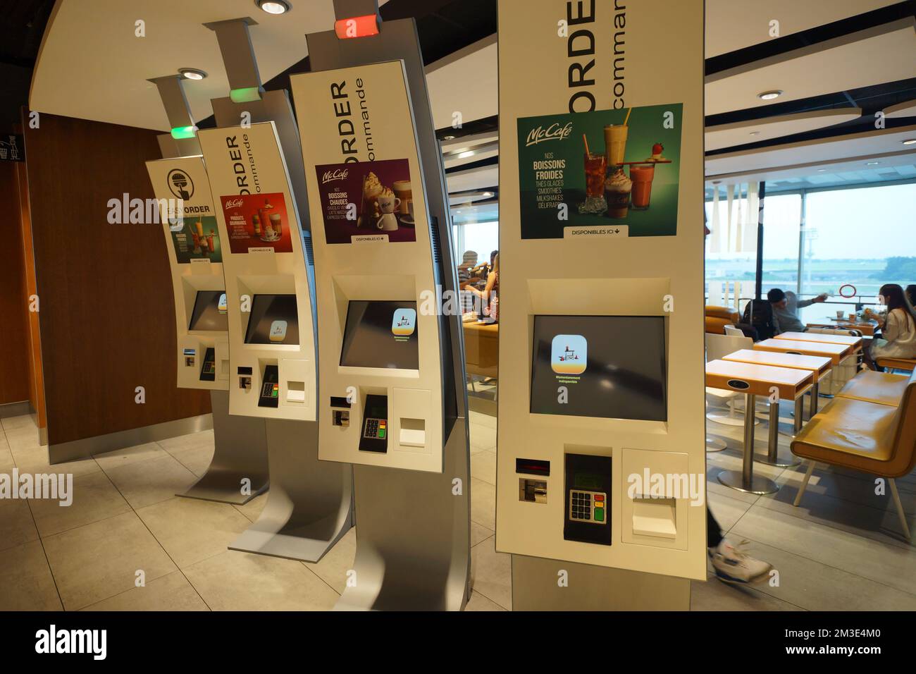 PARIS - SEPTEMBER 04: McDonald's interior in Orly Airport on September 04, 2014 in Paris, France. Paris Orly Airport is an international airport locat Stock Photo