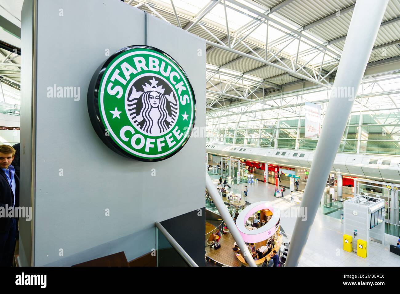 DUSSELDORF - SEPTEMBER 16: Starbucks cafe interior in airport on September 16, 2014 in Dusseldorf, Germany. Dusseldorf Airport is the international ai Stock Photo
