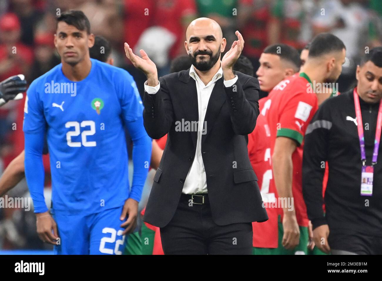 coach REGRAGUI Walid (MAR), goalwart TAGNAOUTI Ahmed Reda (MAR) after the end of the game, applauds to the fans, football fans, gesture. Semi-final, semi-final game 62, France (FRA) - Morocco (MAR) 2-0, on December 14th, 2022, Al Bayt Stadium Football World Cup 20122 in Qatar from November 20th. - 18.12.2022 ? Stock Photo