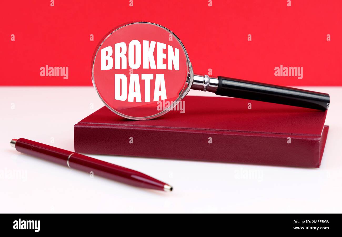 Business and finance concept. On a white and red background, a notebook