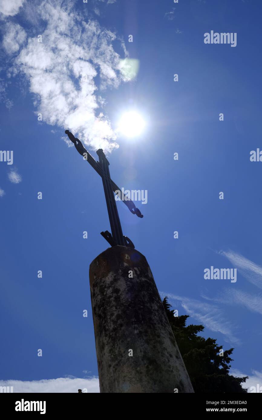Jesus cross against the light from a frog's perspective Stock Photo Alamy
