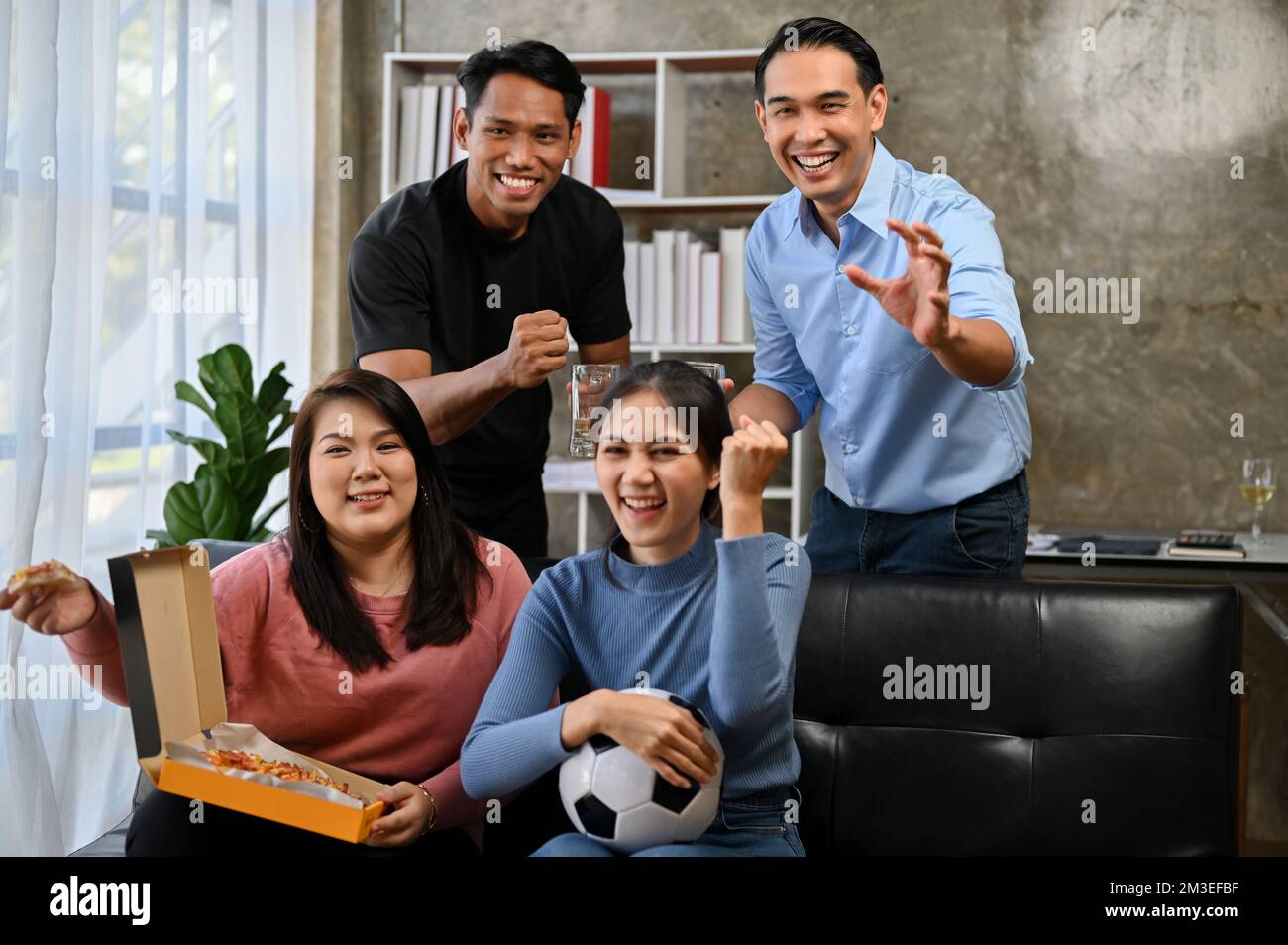 Excited group young sports fans hi-res stock photography and images - Alamy