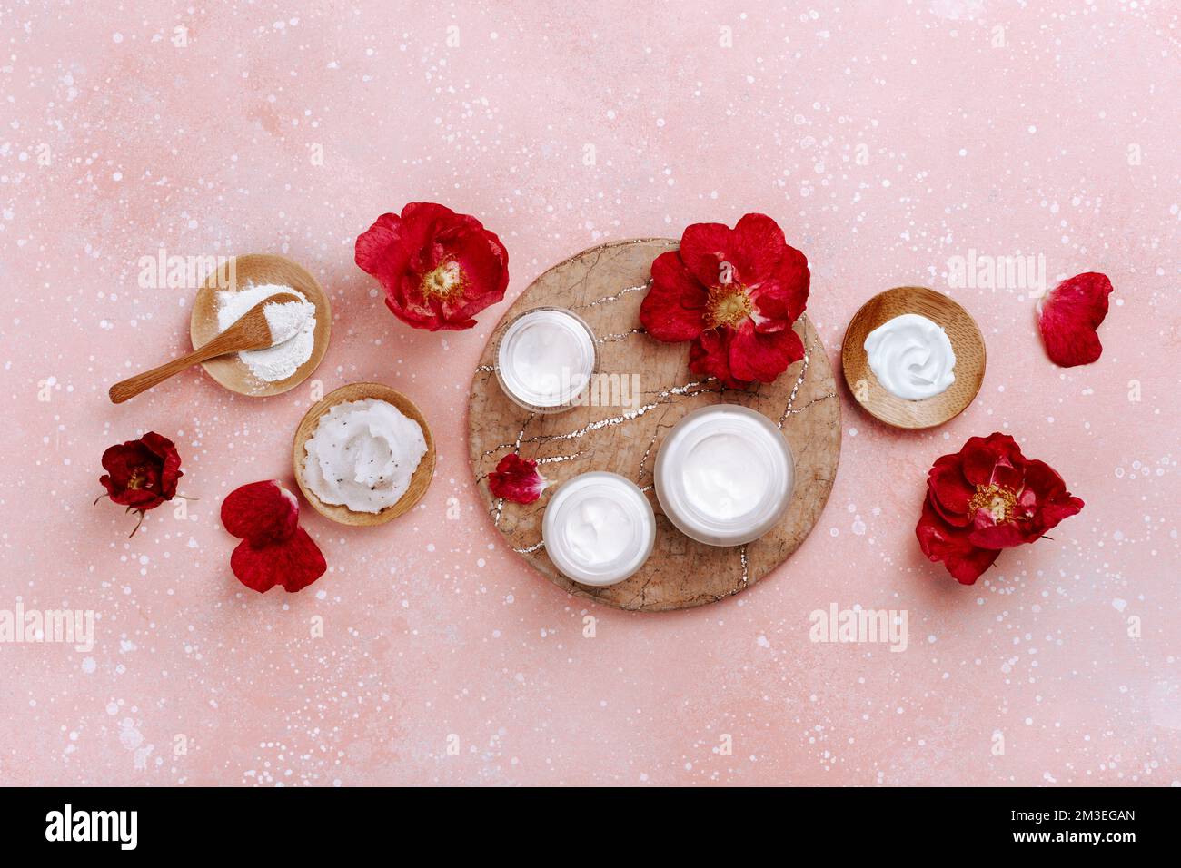 skincare products and dog rose flowers. natural cosmetics for home spa treatment Stock Photo