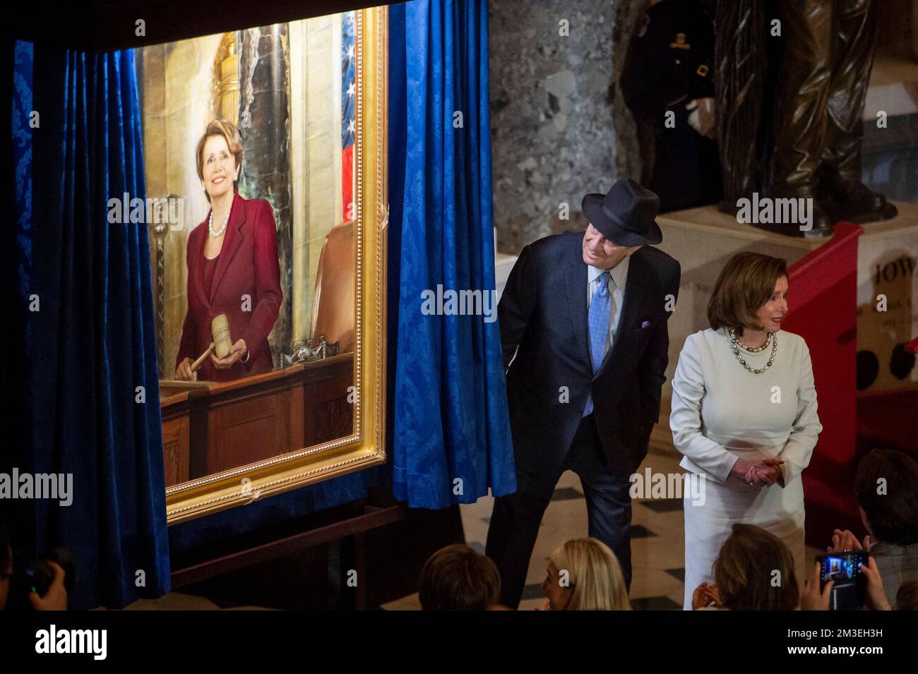 Speaker of the United States House of Representatives Nancy Pelosi (Democrat of California) is joined by her husband Paul Pelosi during a ceremony to unveil her official portrait in Statuary Hall at the US Capitol in Washington, DC, USA, Wednesday, December 14, 2022. Photo by Rod Lamkey/CNP/ABACAPRESS.COM Stock Photo
