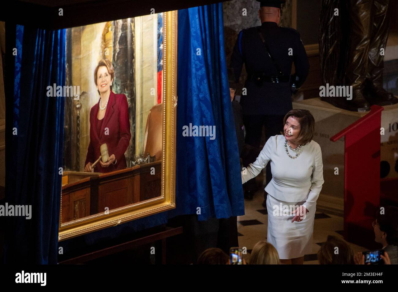 Speaker of the United States House of Representatives Nancy Pelosi (Democrat of California) is joined by her husband Paul Pelosi as she draws back the curtain to unveil her official portrait in Statuary Hall at the US Capitol in Washington, DC, USA, Wednesday, December 14, 2022. Photo by Rod Lamkey/CNP/ABACAPRESS.COM Stock Photo