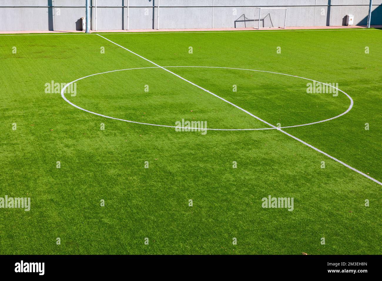 Center circle of a football or soccer field at daytime. Football