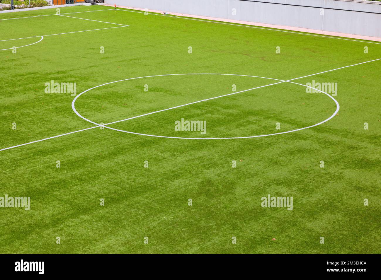 Soccer or football field. Center circle and halfway line of a soccer field. Football background photo. Stock Photo
