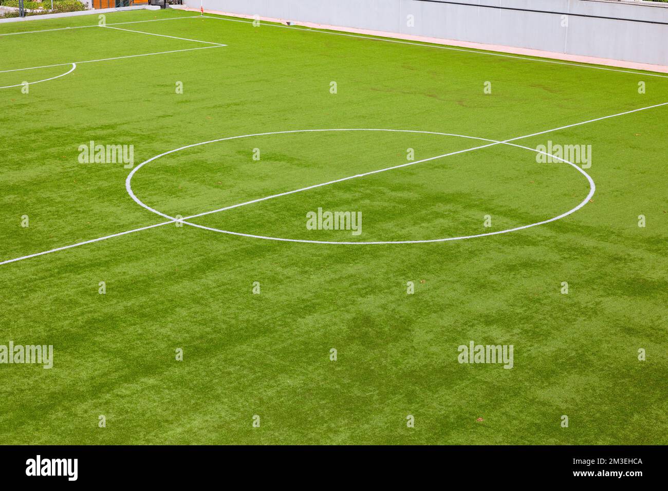 Soccer or football field. Center circle and halfway line of a soccer field. Football background