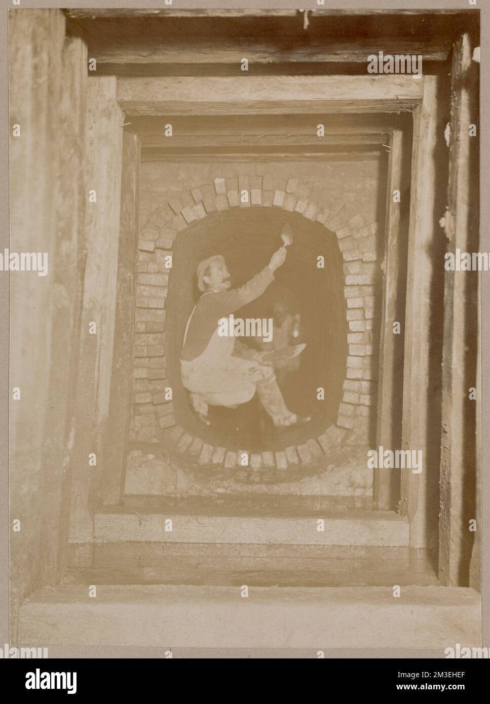Man mortaring sewer wall , Masonry, Sewers Edgar Sutton Dorr Photograph