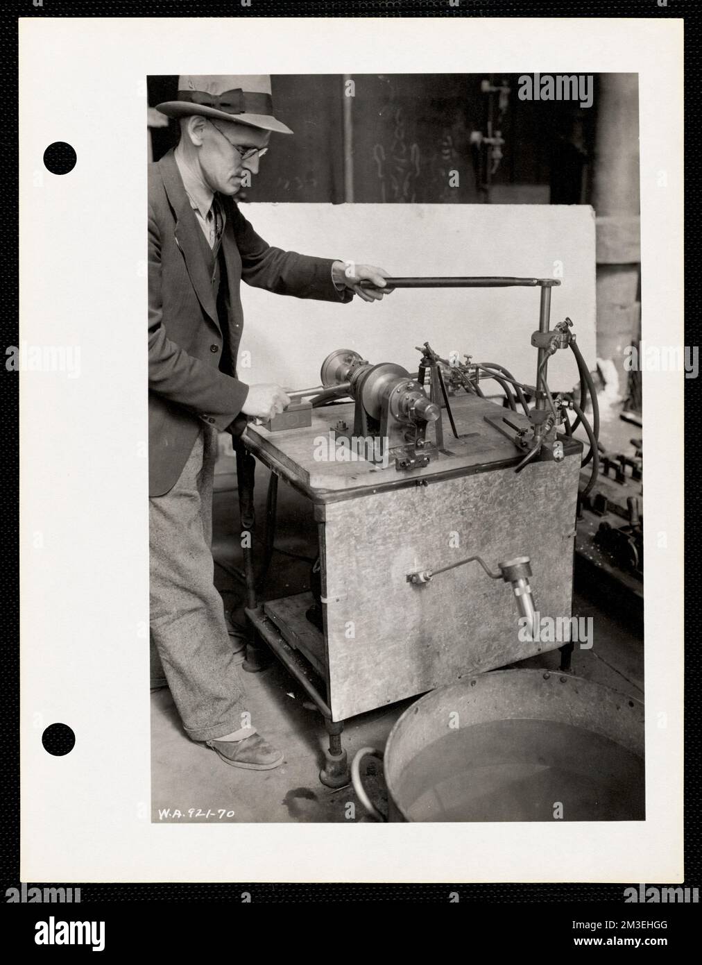 Man Operating Machine Label Ordnance manufacturing process hi-res stock photography and images - Alamy