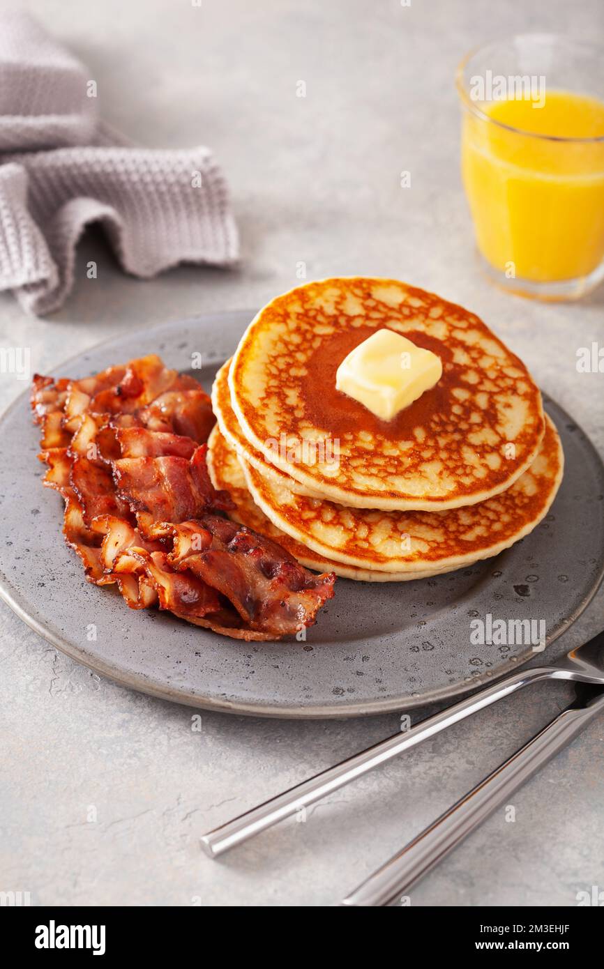 sweet pancakes with butter and bacon. traditional american breakfast Stock Photo