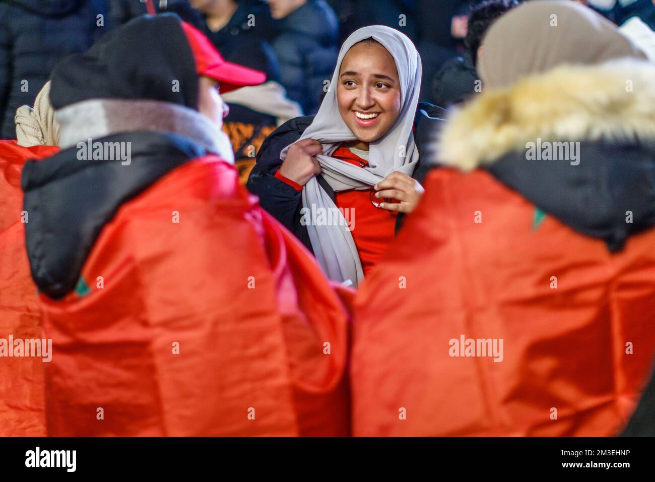 Morocco soccer fans celebrates the continued success of the Moroccan football team at Qatar 2022. Stock Photo