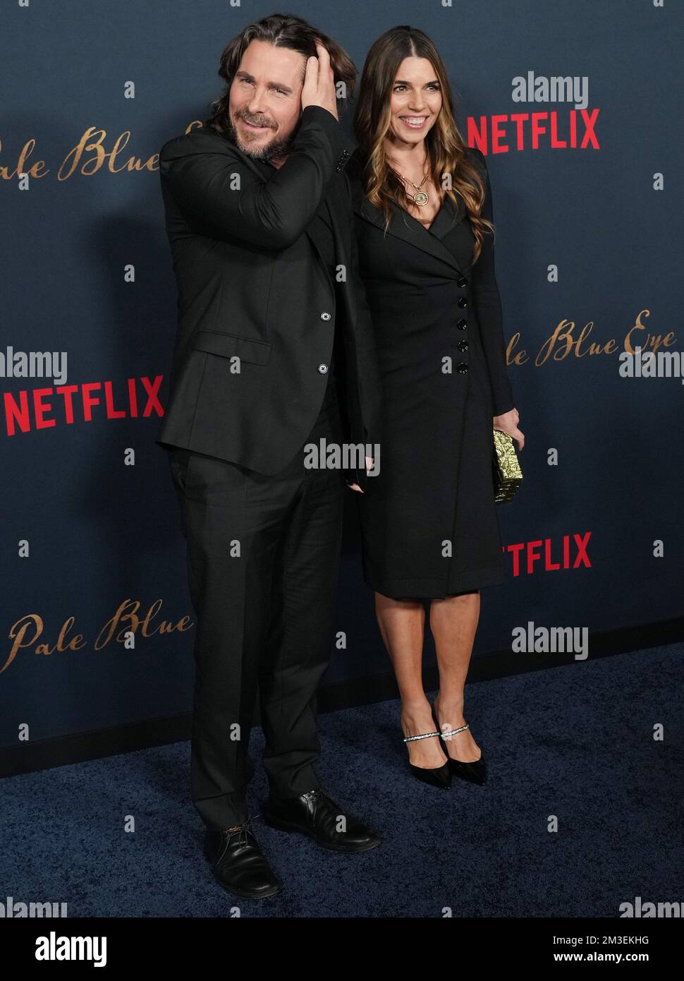 (LR) Christian Bale and Sibi Bla i? arrives at THE PALE BLUE EYE Los