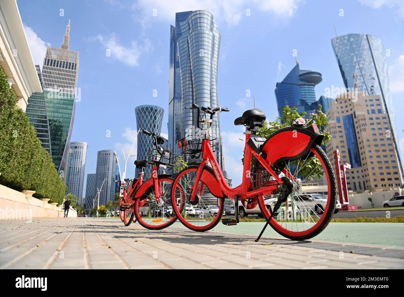 Doha, Katar. 12th Dec, 2022. Parked rental bikes, streets, Hochaeuser