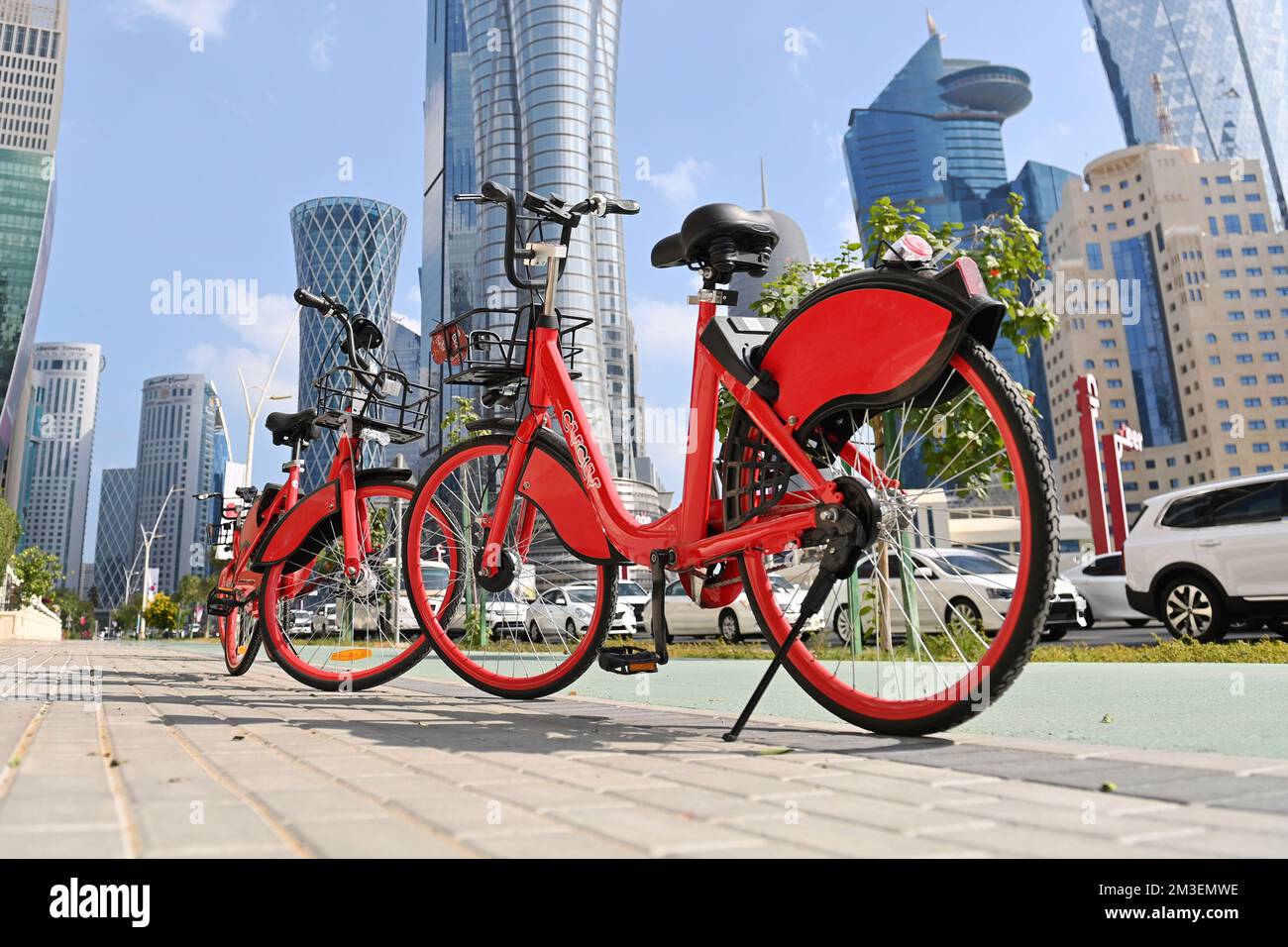 Doha, Katar. 12th Dec, 2022. Parked rental bikes, streets, Hochaeuser