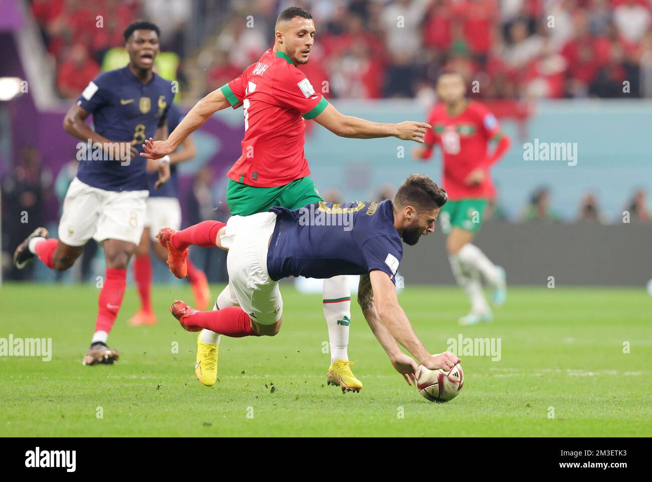 Olivier Giroud of France and Selim Amallah of Morocco during the FIFA