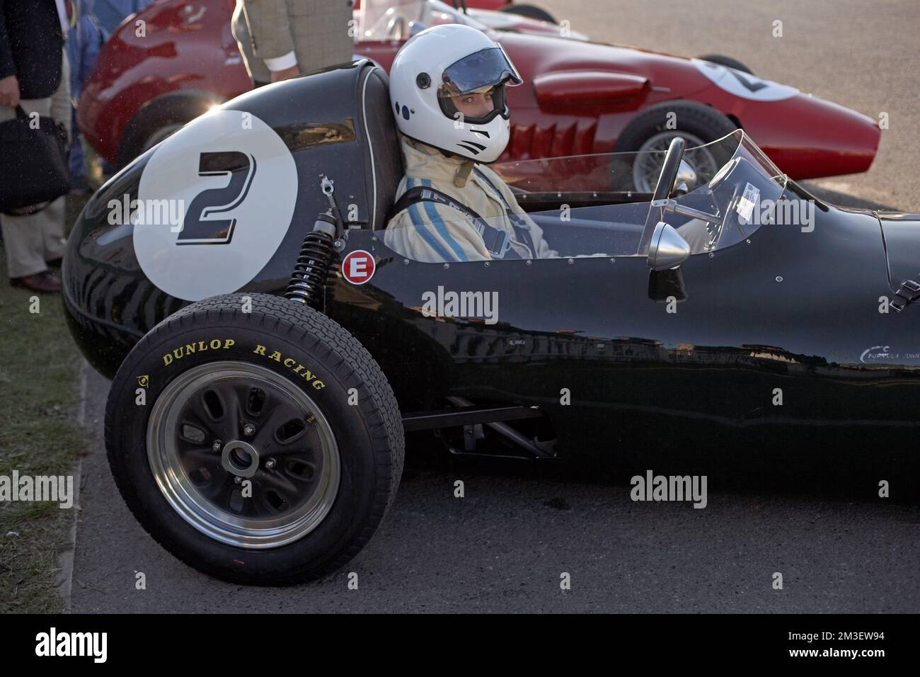 GOODWOOD, WEST SUSSEX/UK -   Race driver sitting ready for the race at Vintage Racing at  Goodwood Revival . Stock Photo