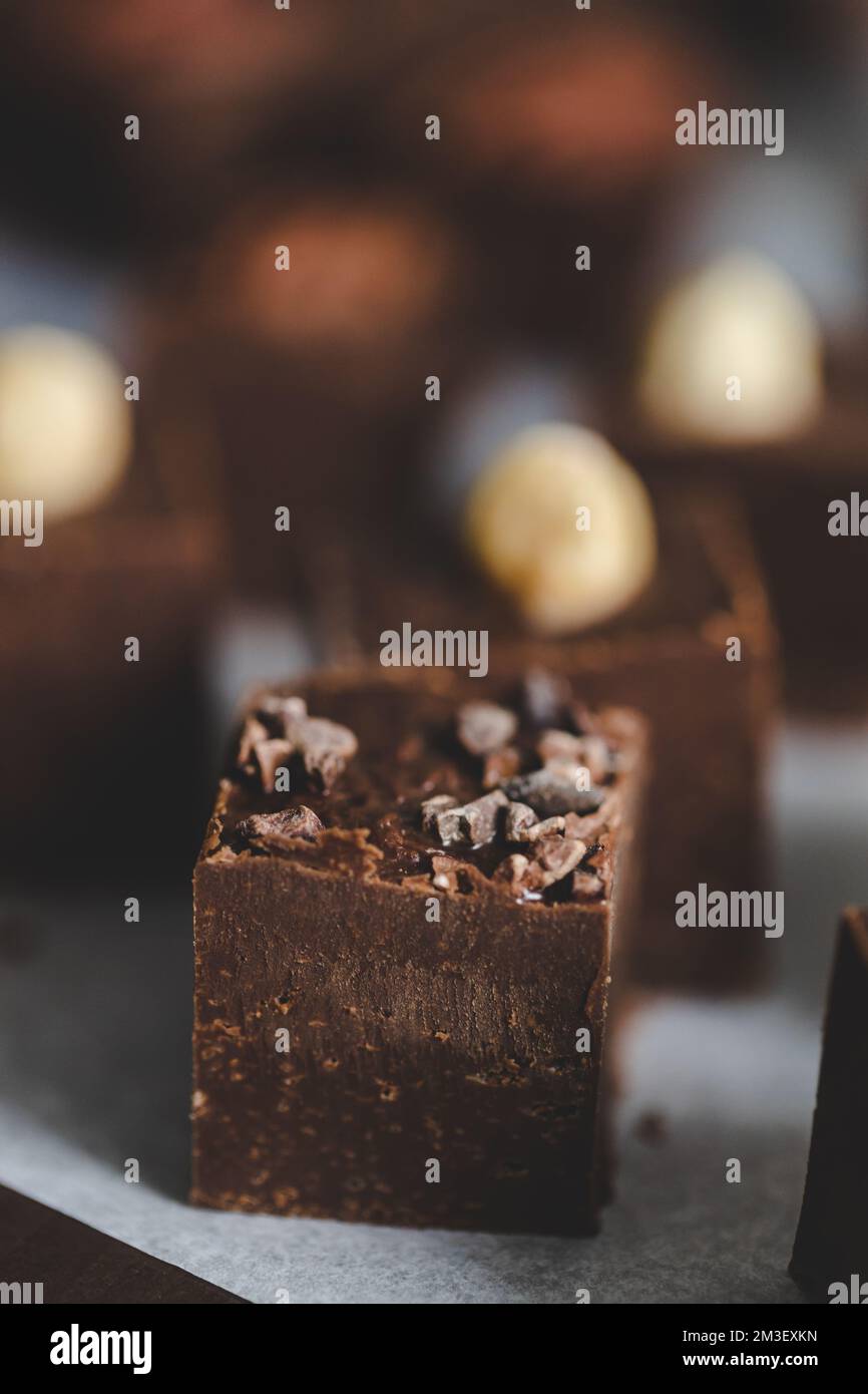 Homemade chocolate fudge with cocoa beans and hazelnuts Stock Photo Alamy