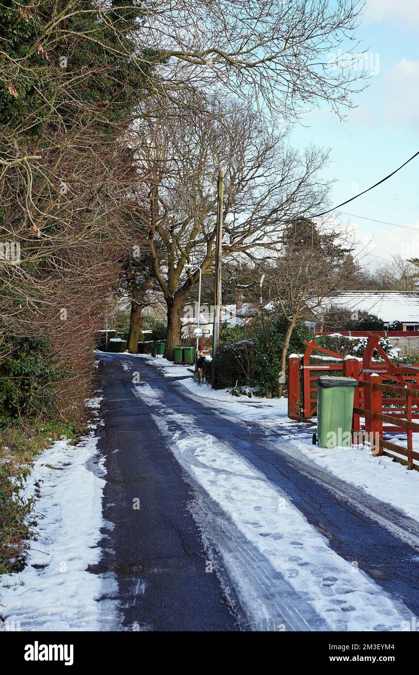 snow-covered Garthet's lane on the suburbs of the town Stock Photo