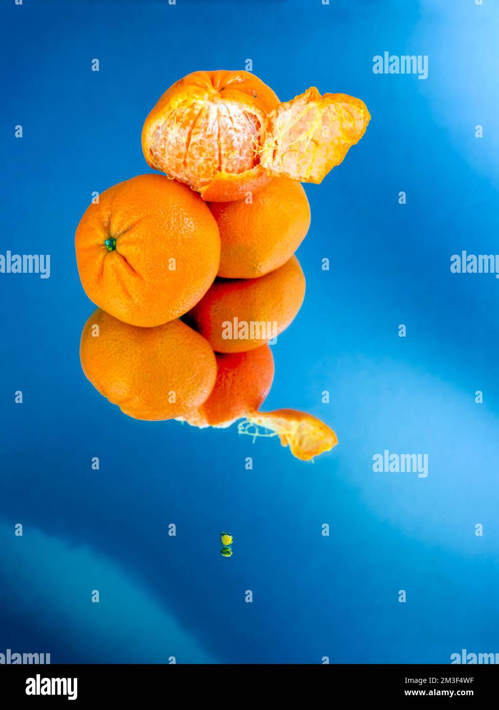 Easy peel sweet Tangerines on clean neutral background. Natural close