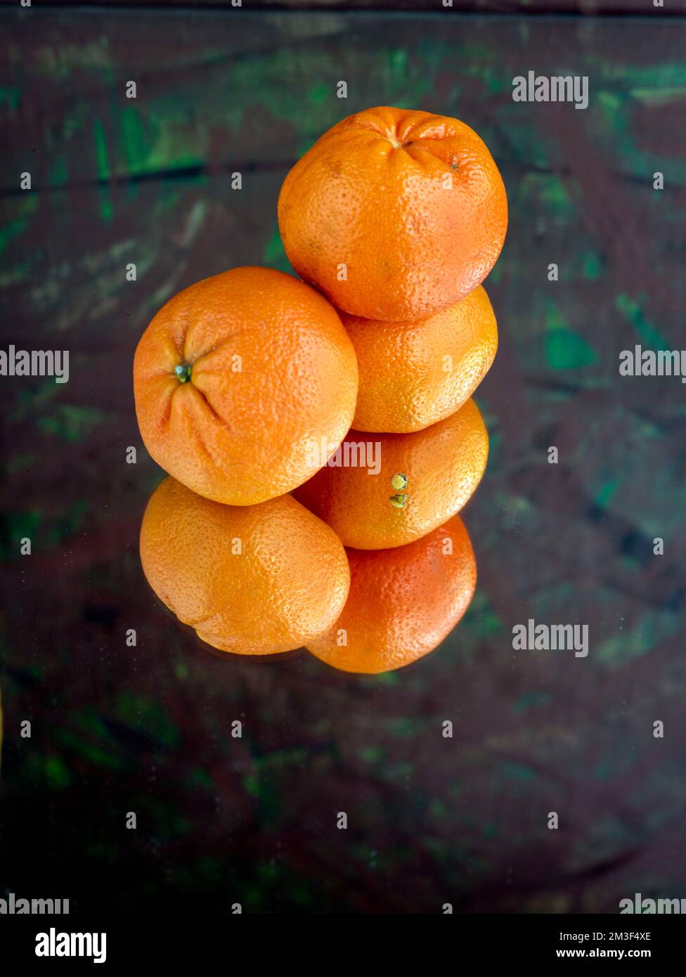 Easy peel sweet Tangerines on clean neutral background. Natural close