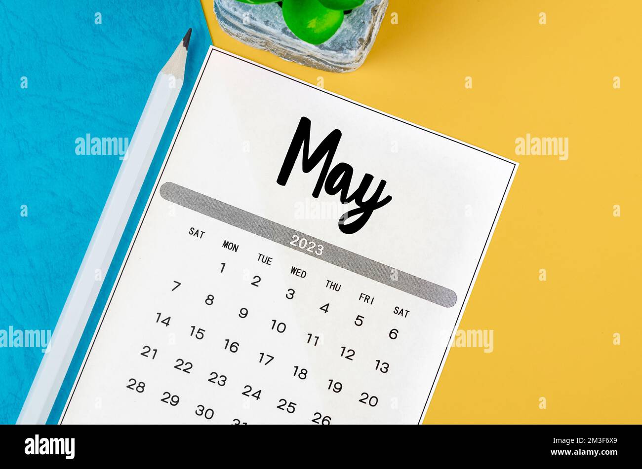 May 2023 Monthly calendar for 2023 year with pencil on beautiful background  Stock Photo - Alamy