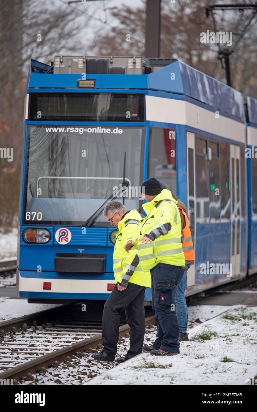 Rostock, Germany. 15th Dec, 2022. DEKRA and RSAG employees investigate
