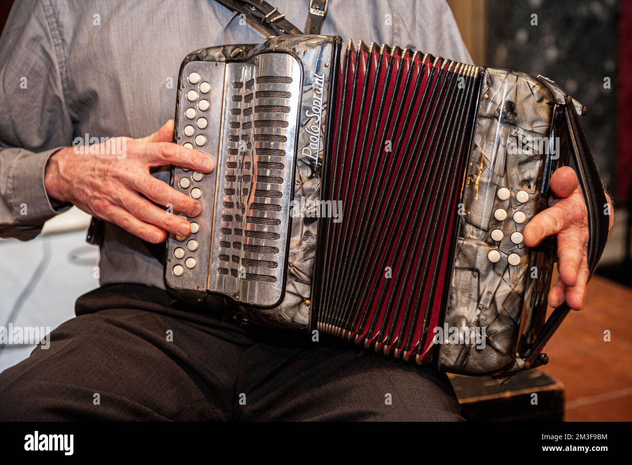 Button accordion player Irish traditional musical instrument Stock Photo