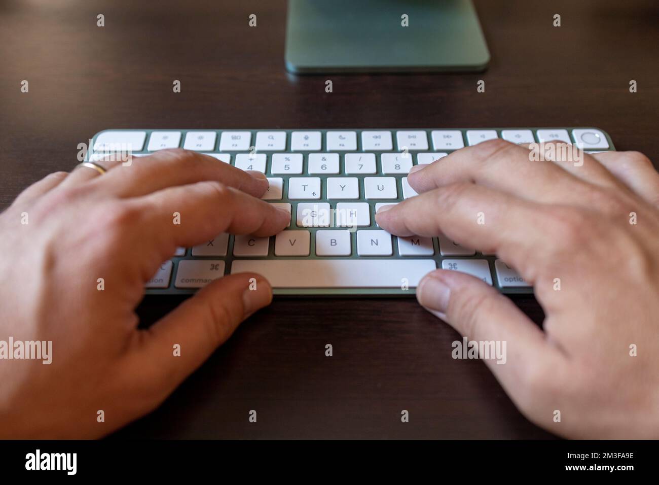 Hands typing on computer keyboard. man hands on the keyboard Working at ...