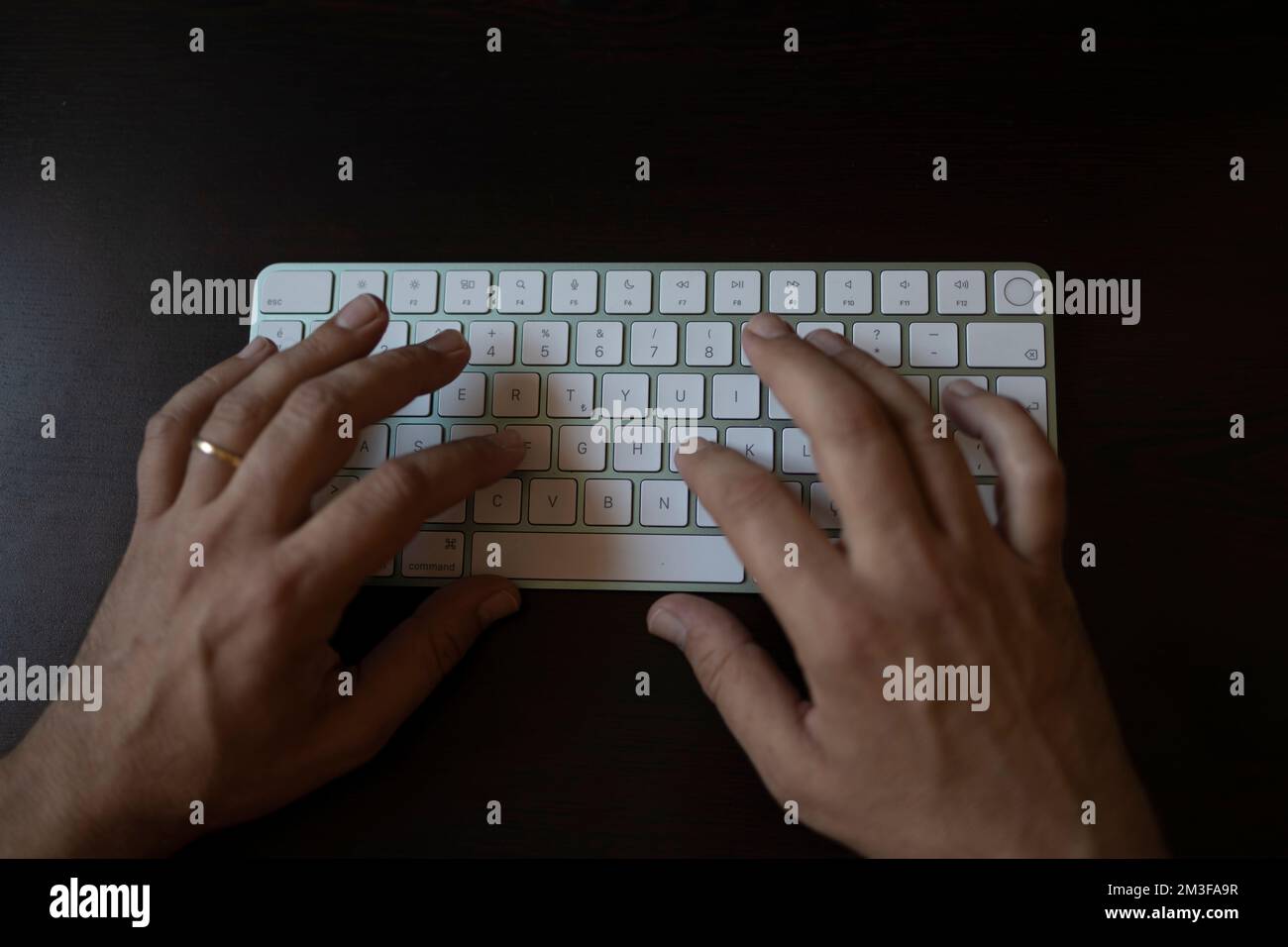 Hands typing on computer keyboard. man hands on the keyboard Working at ...