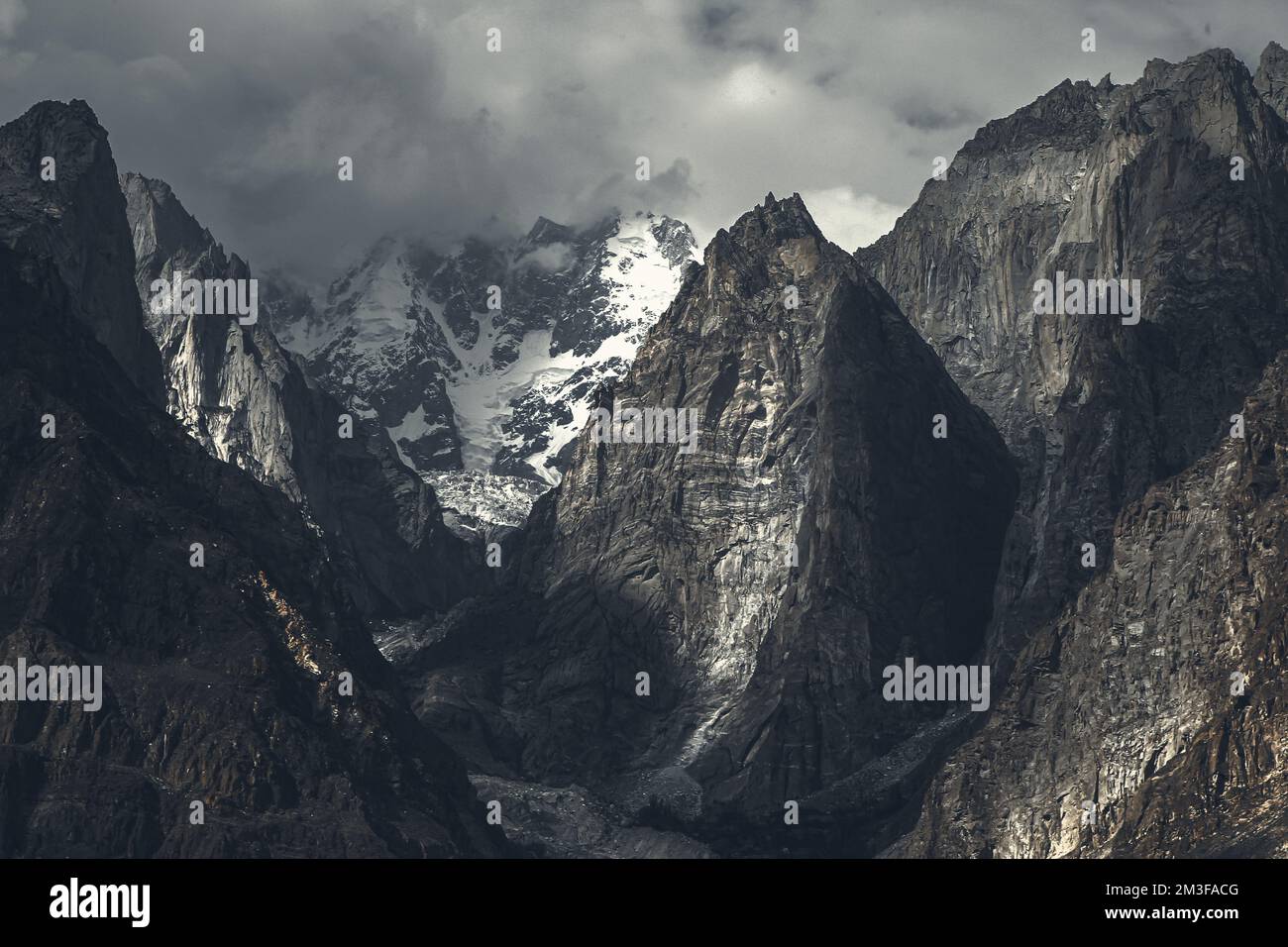A high mountain landscape covered with snow Stock Photo - Alamy