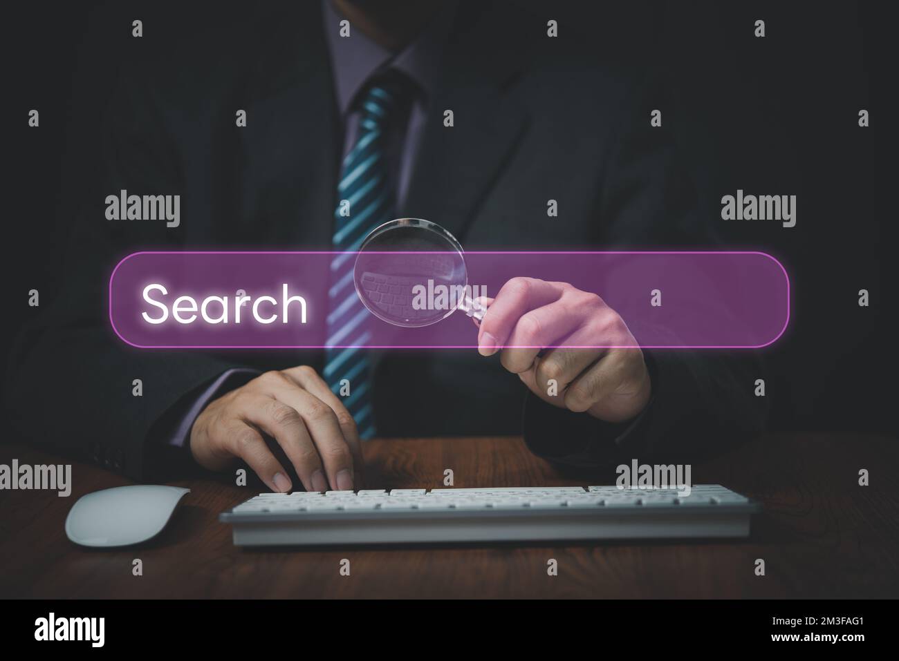 Man use computer to Searching for information.Search On Virtual Screen Data Search Technology Search Engine Optimization.Internet website online conce Stock Photo