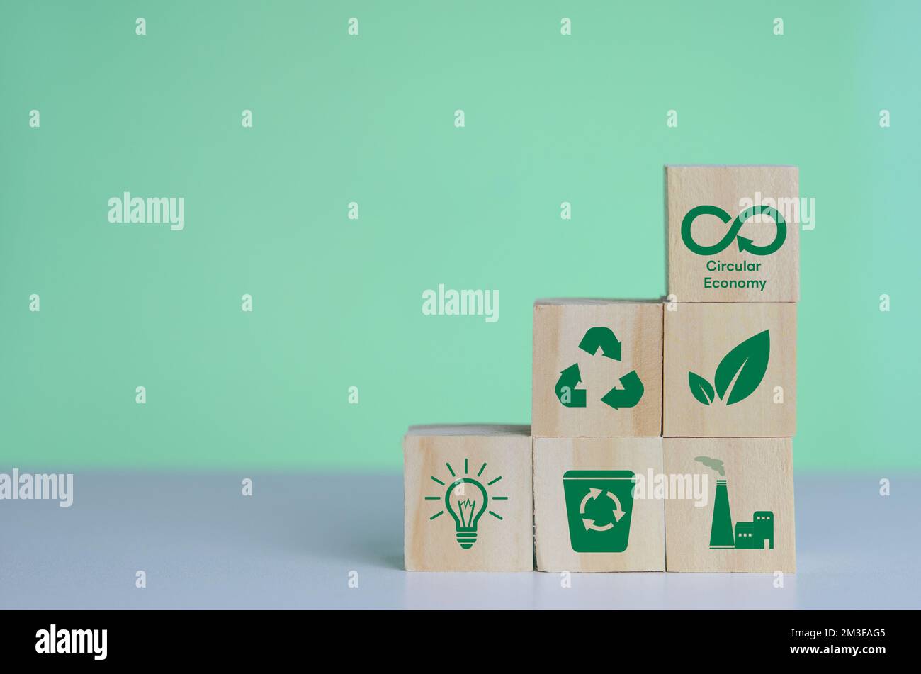 Net zero green technology innovation eco carbon renewable energy business Circular Economy concept with wood cube blocks. Stock Photo