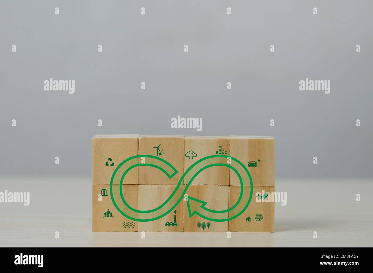 Net zero green eco infinity technology innovation eco carbon renewable energy sustainable development business Circular Economy concept with wood cube Stock Photo