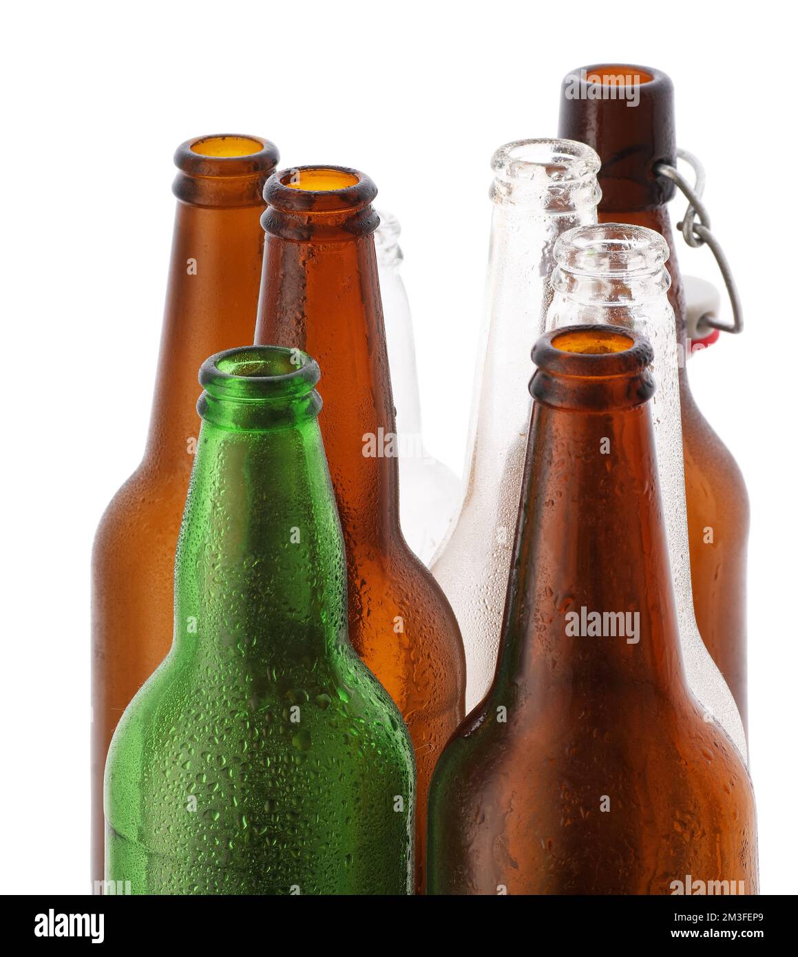 eight empty beer bottles on a white background Stock Photo Alamy