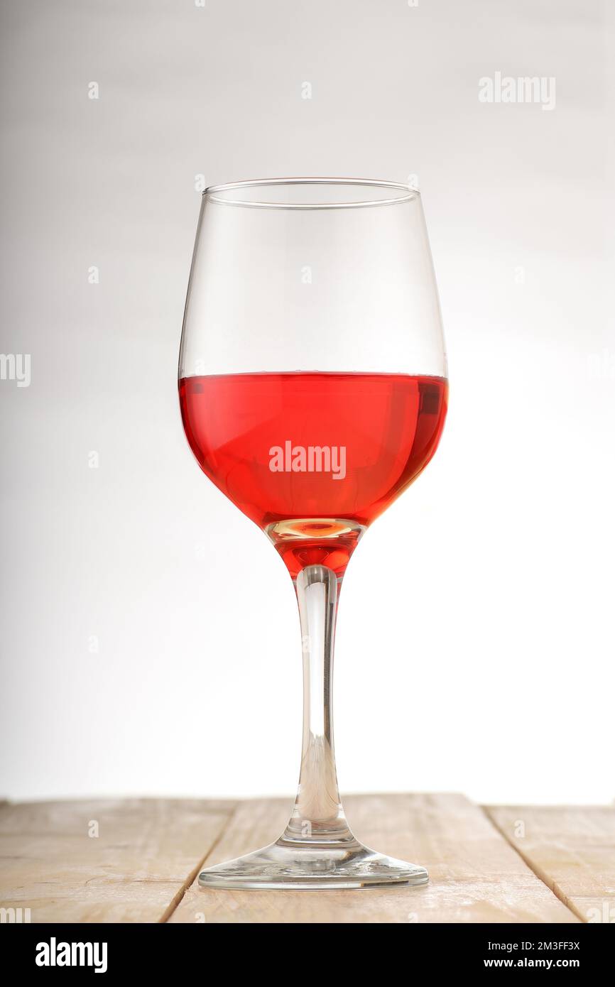 Half full red wine glass hi-res stock photography and images - Alamy