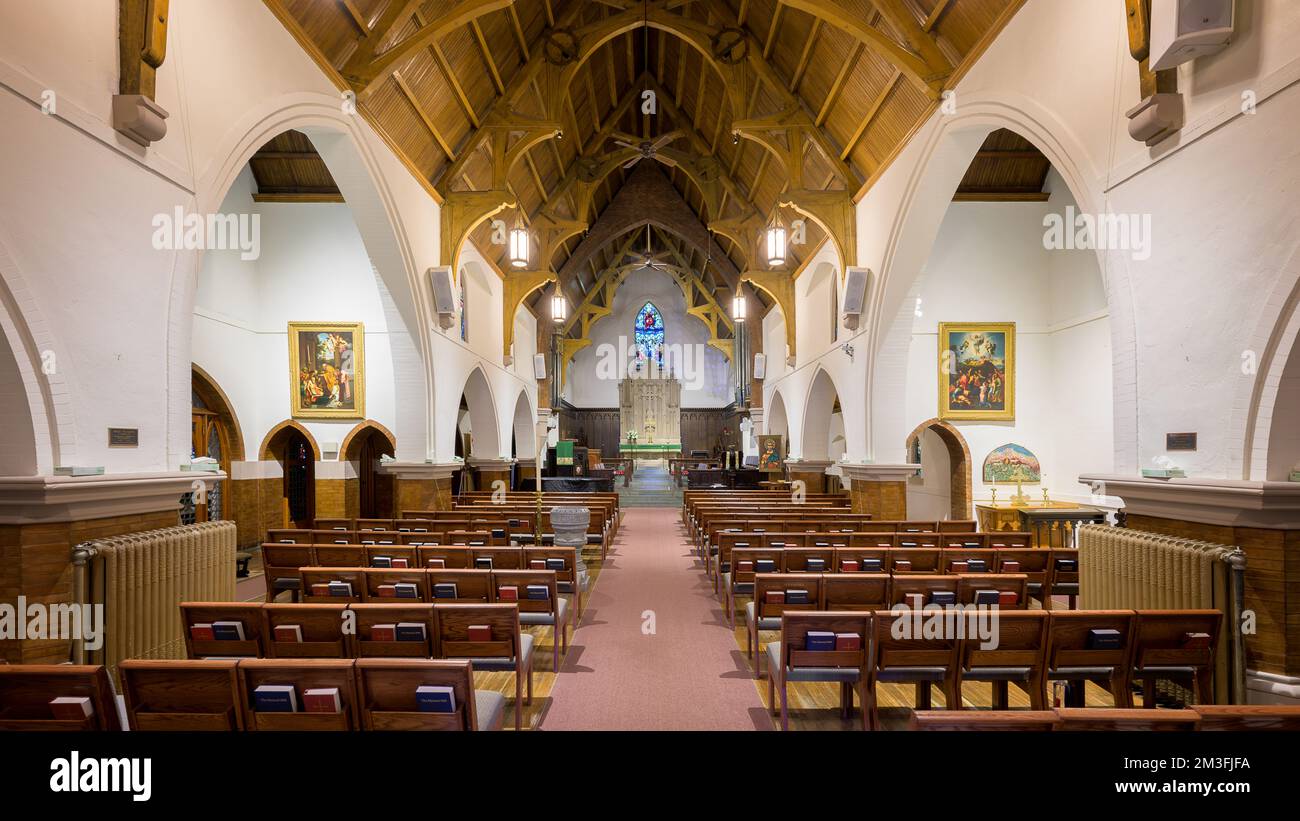 Panoramic view of the interior nave of the historic St. Matthew's Episcopal Cathedral in Laramie, Wyoming Stock Photo