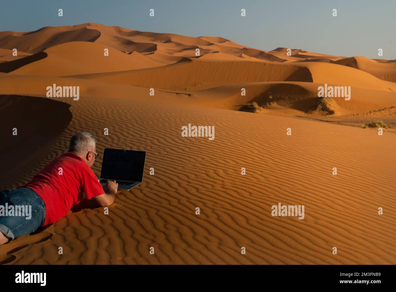 Remote work from the desert Stock Photo