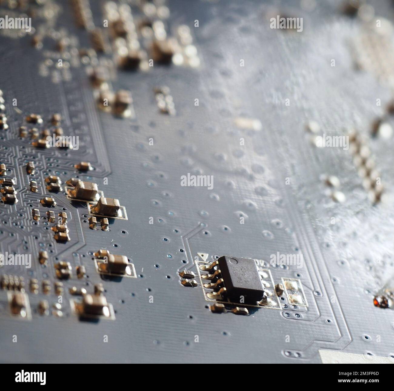 Close-up of electronic circuit board. Microchip consept background. Digital electronic background. Stock Photo