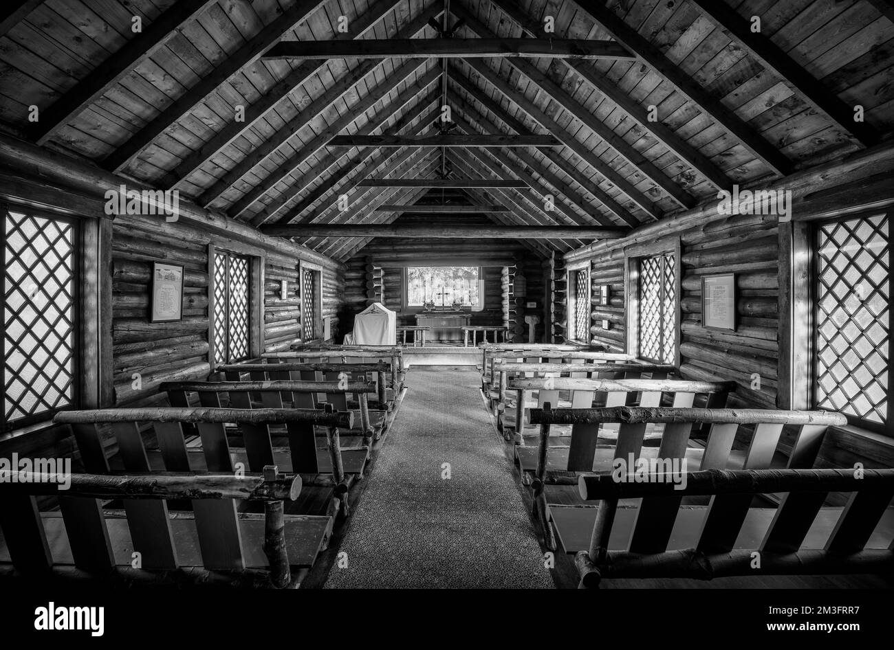 Interior of the historic Chapel of the Transfiguration in Grand Teton National Park near Moose, Wyoming Stock Photo