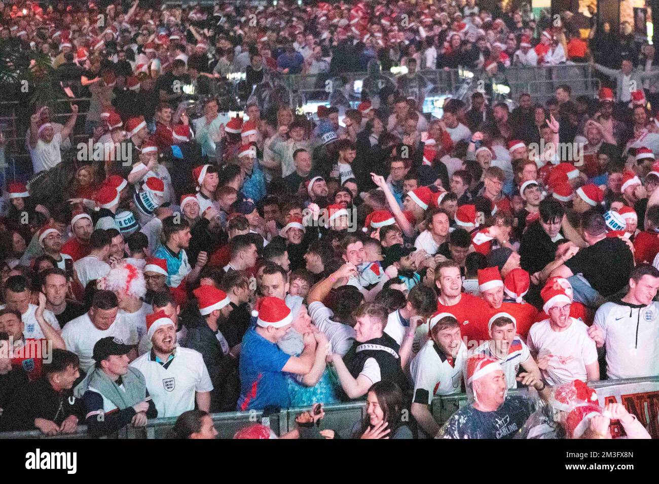 England fans throw beer in the air at Boxpark, Wembley, London, as