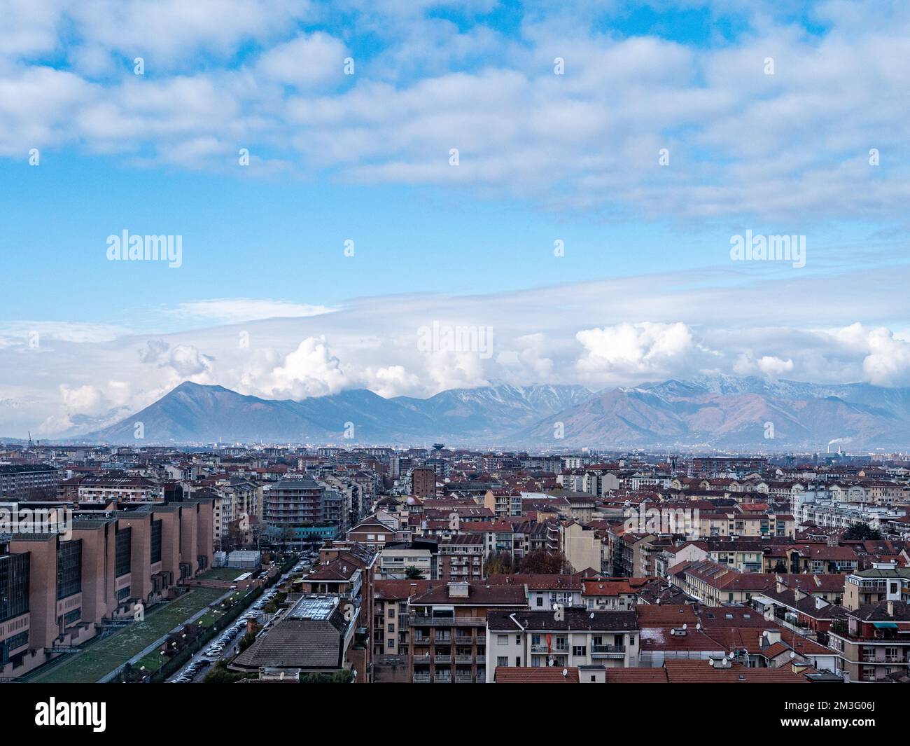 Skyline of Turin, Italy, in winter. The mountain in back and the Mole Antonelliana, Piazza Castello, Porta Susa Station, Turin court and the city cent Stock Photo