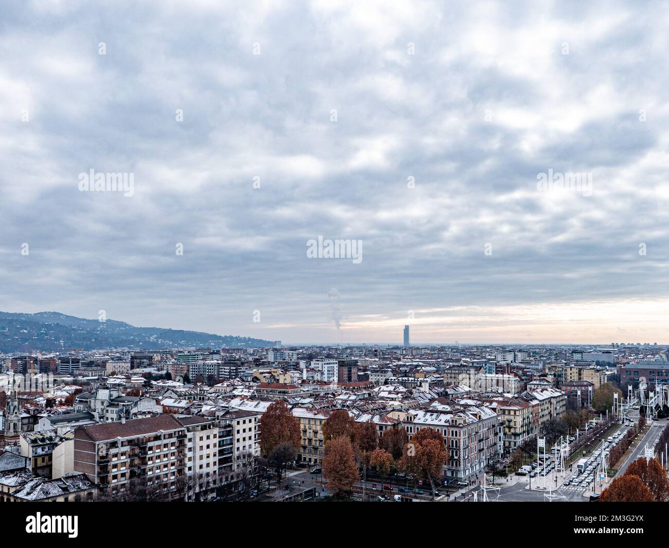 Skyline of Turin, Italy, in winter. The mountain in back and the Mole