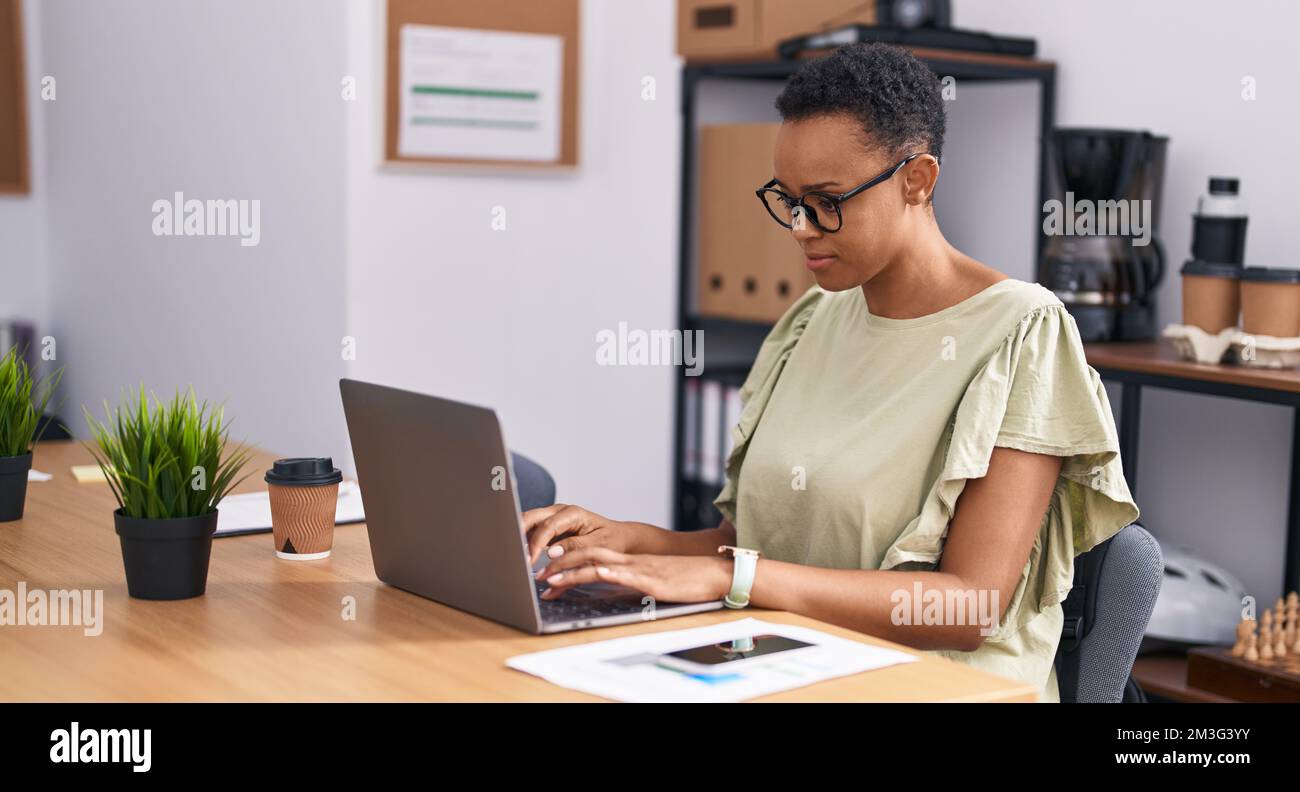 African american woman business worker using laptop working at office ...