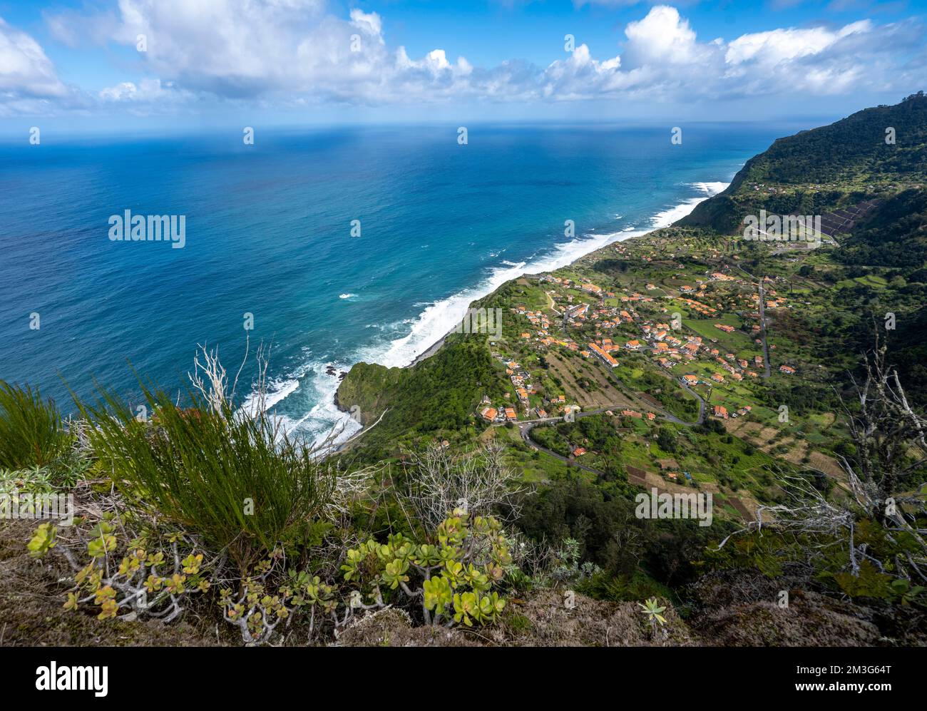 Ridge of Pico do Alto, view of coast and sea with village Arco de Sao Jorge, Madeira, Portugal Stock Photo